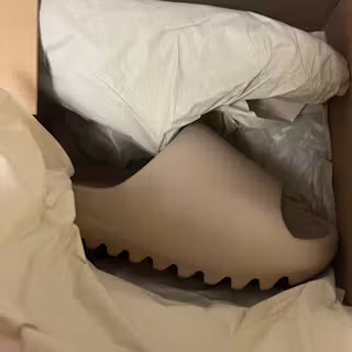 adidas Yeezy Slides 'Pure' (RESTOCK) GW1934 adidas Yeezy Slides 'Pure' (RESTOCK) GW1934