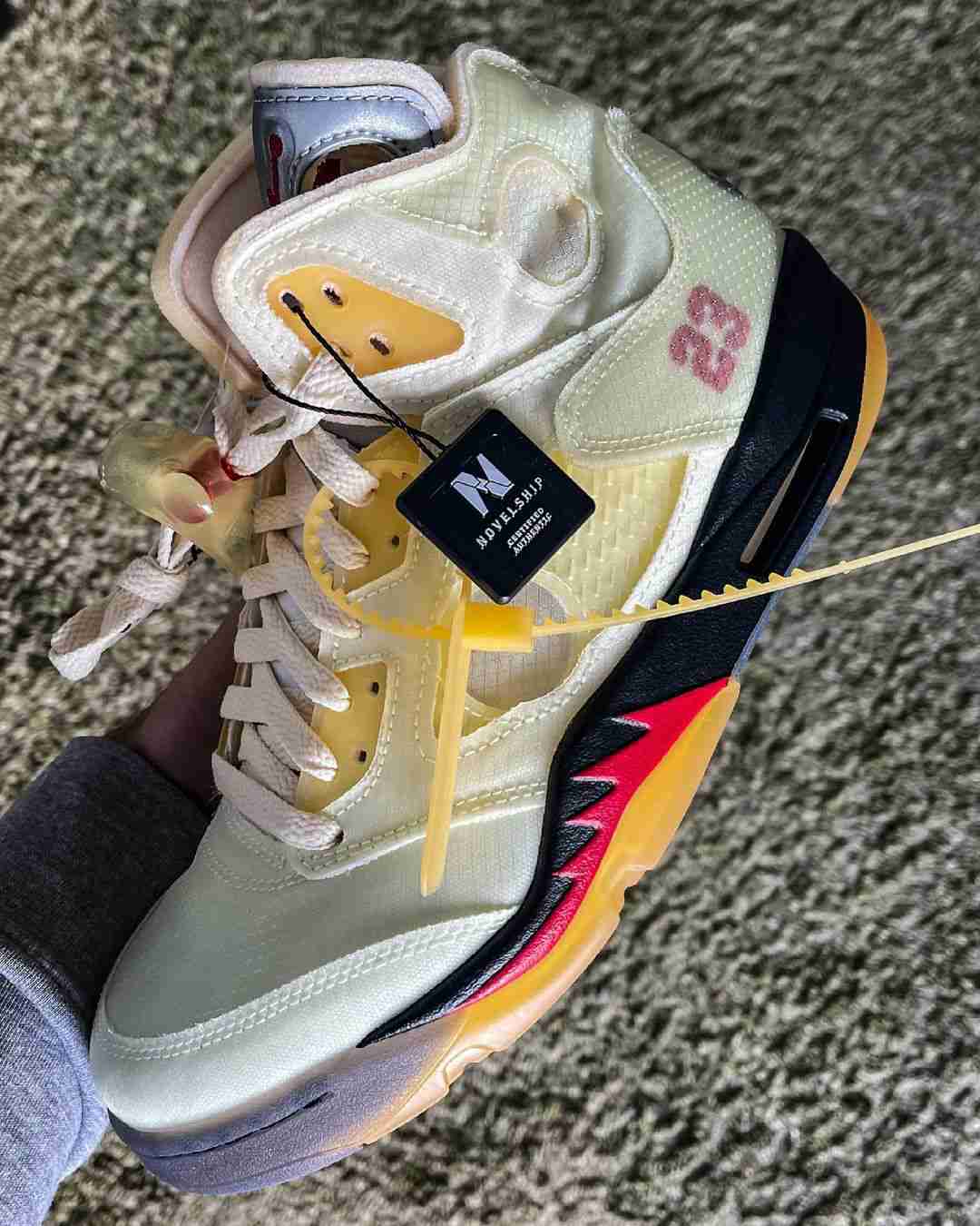 Off‑White x Air Jordan 5 SP 'Sail' [also worn by DJ Love] DH8565