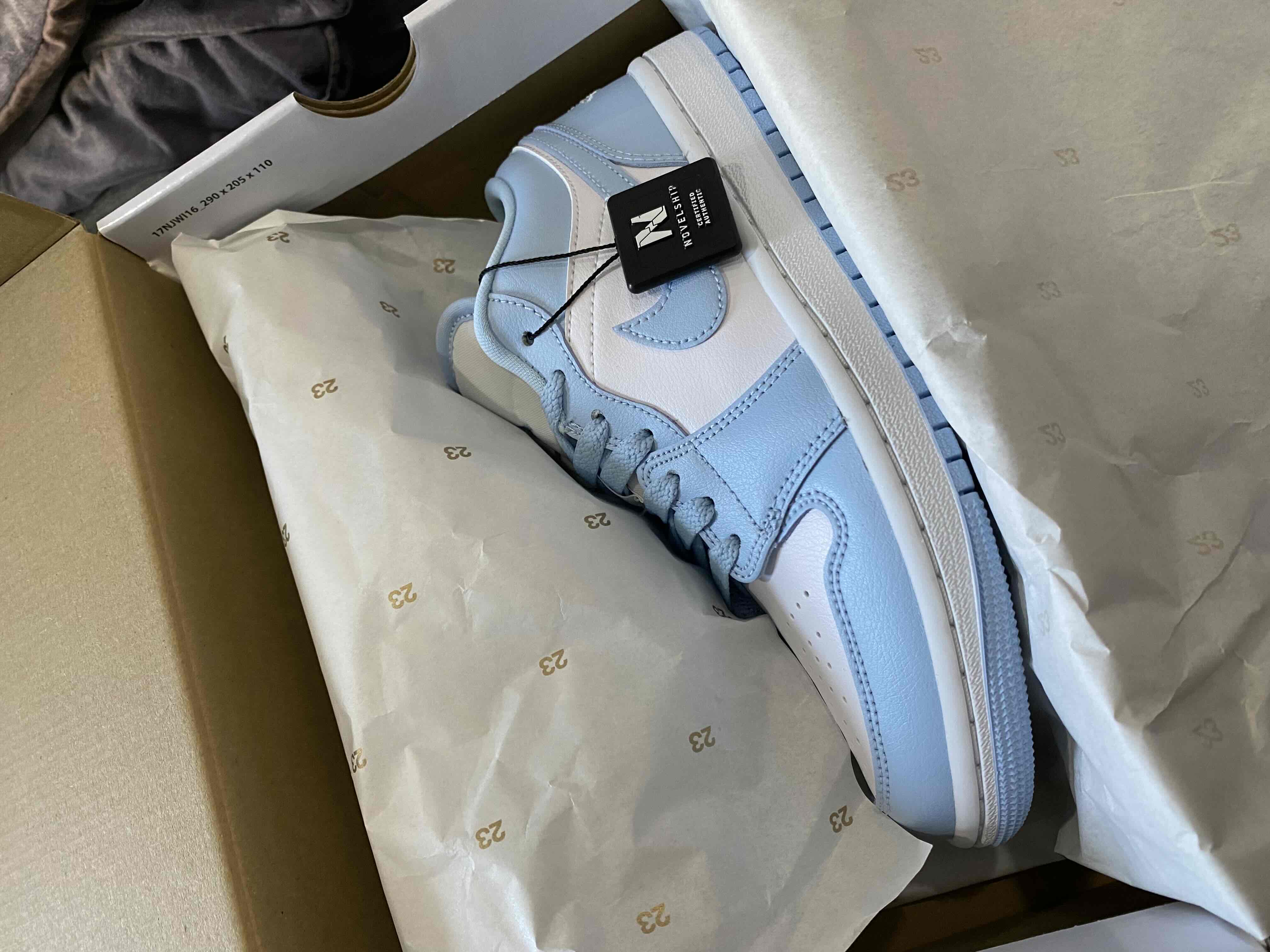 White and blue hot sale low top jordans