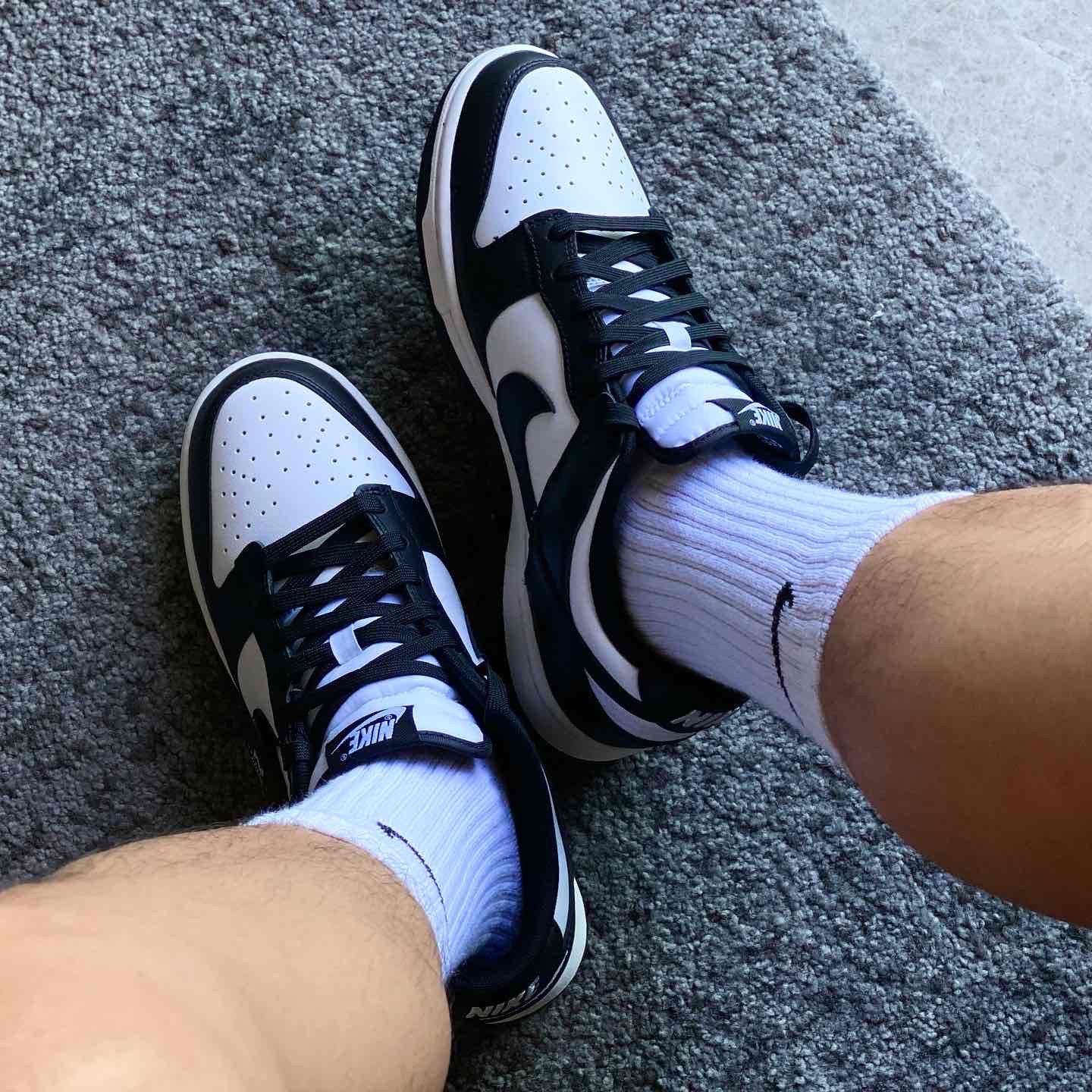 nike dunk black and white on feet