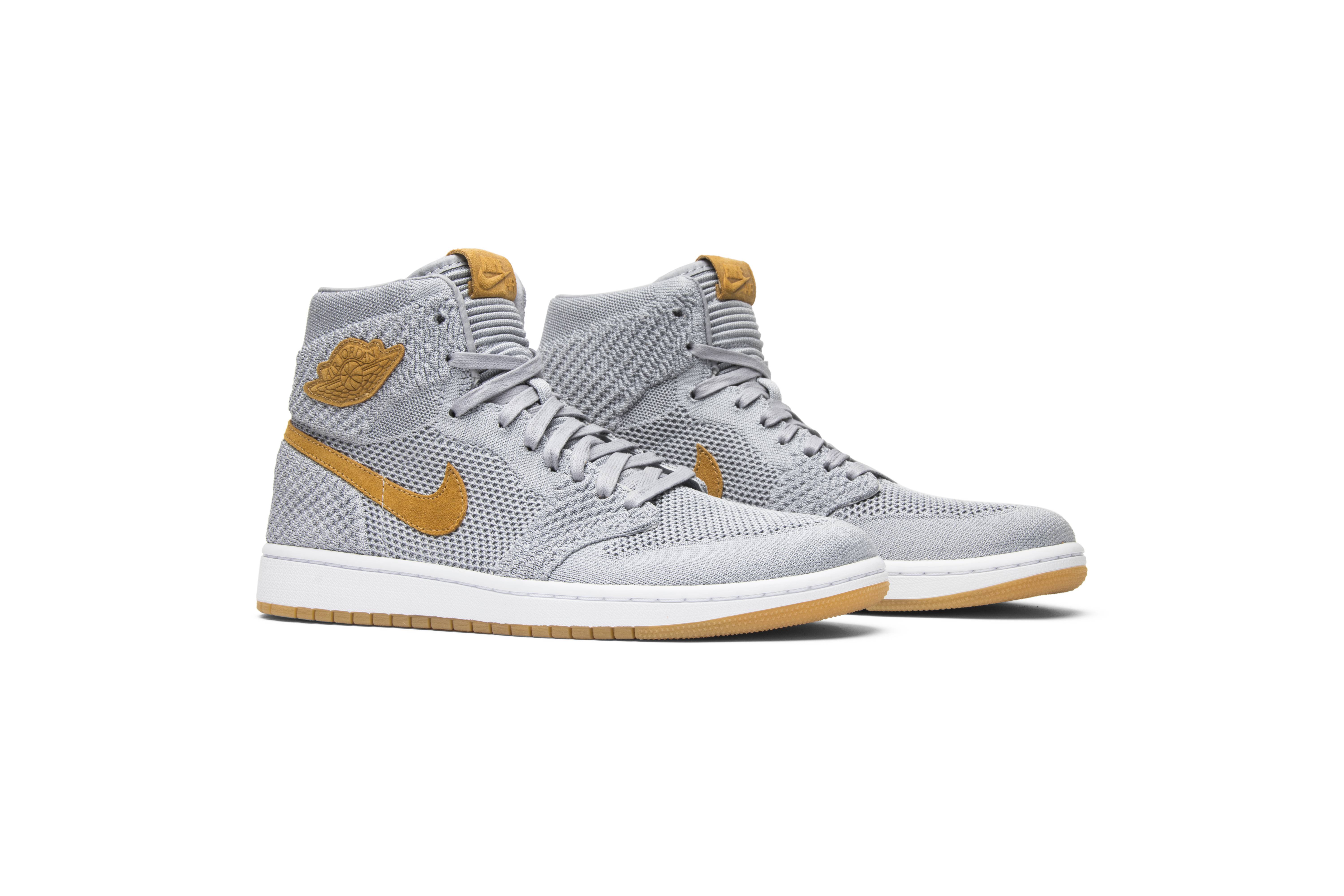 white and red nike sneakers