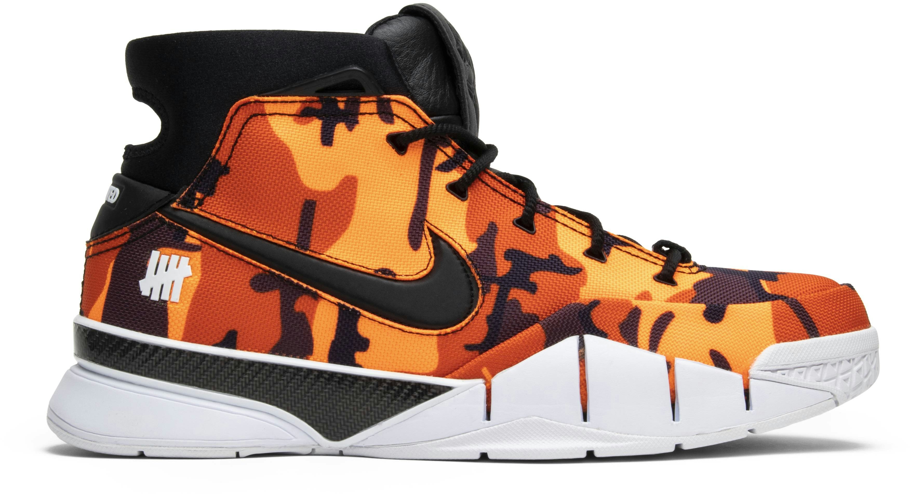 Nike undefeated camo hot sale