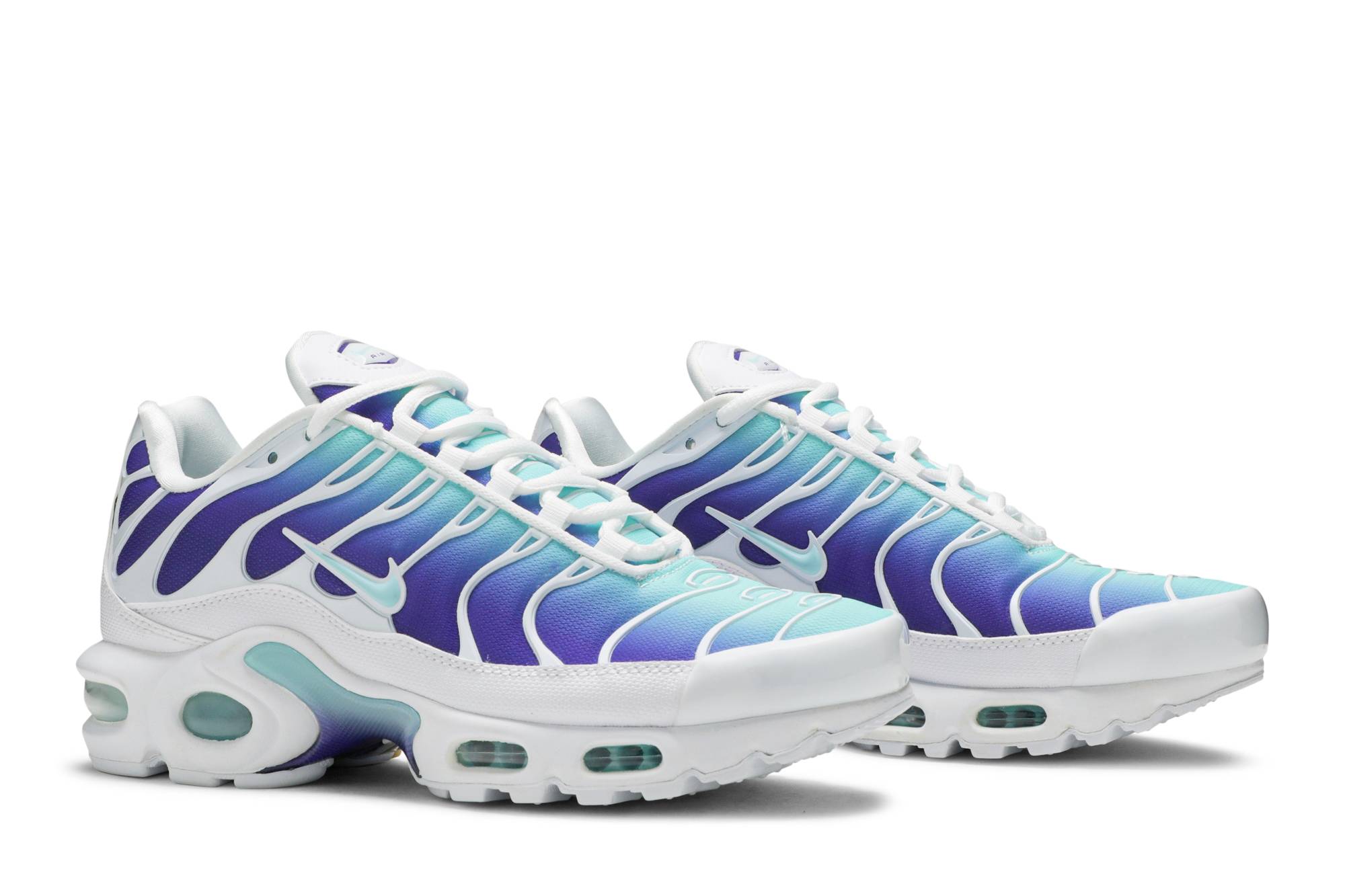 white and aqua air max plus