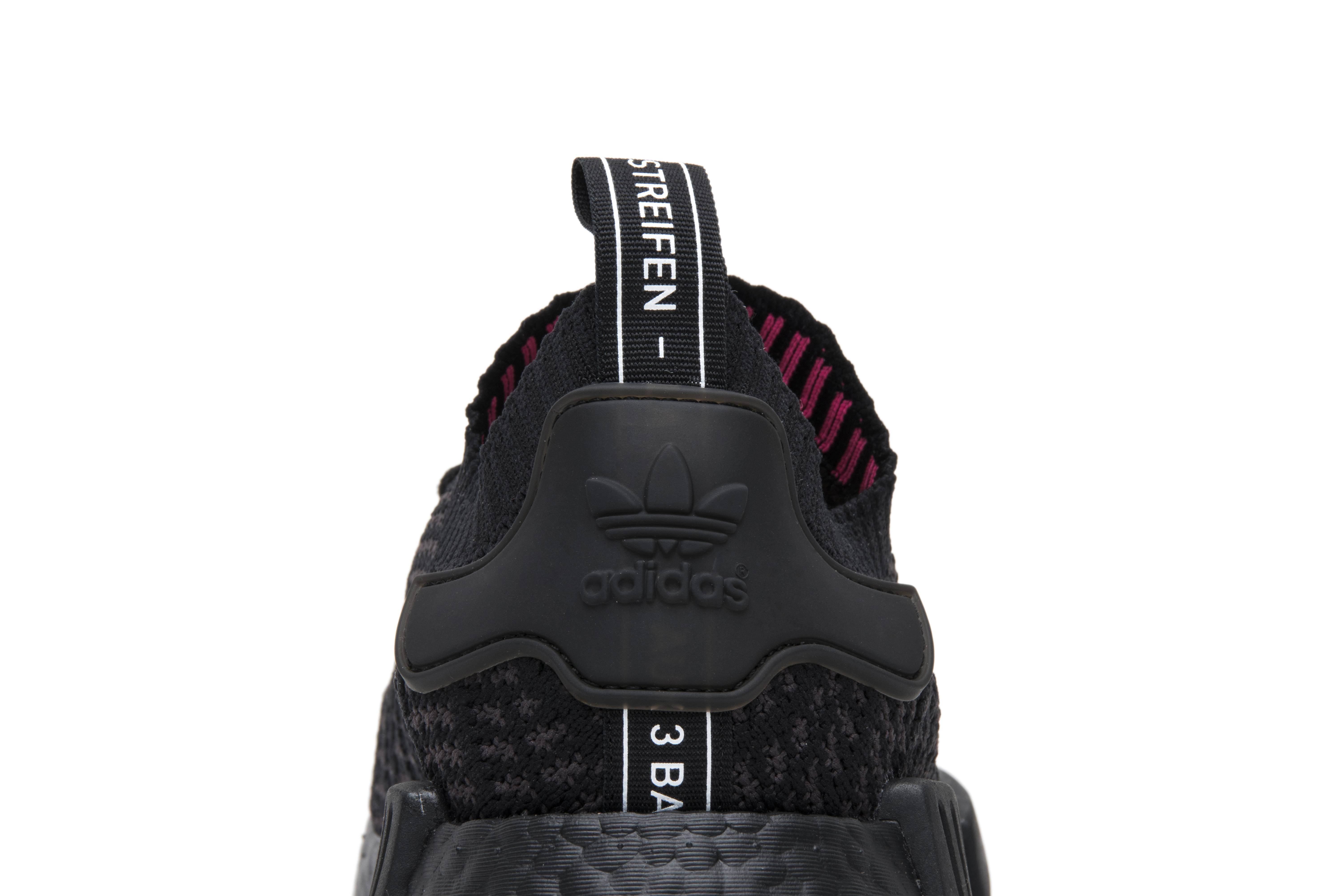 nmd r1 stlt pk triple black