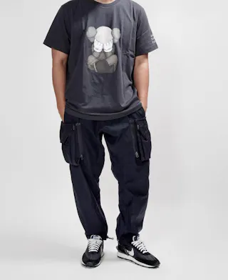 KAWS x Uniqlo Tokyo First Tee (Japanese Sizing) Dark Grey KAWS x Uniqlo Tokyo First Tee (Japanese Sizing) Dark Grey