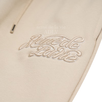 acmé de la vie Curly Logo Emboss Embroidery Sweat Pants Beige Lookbook acmé de la vie Curly Logo Emboss Embroidery Sweat Pants Beige