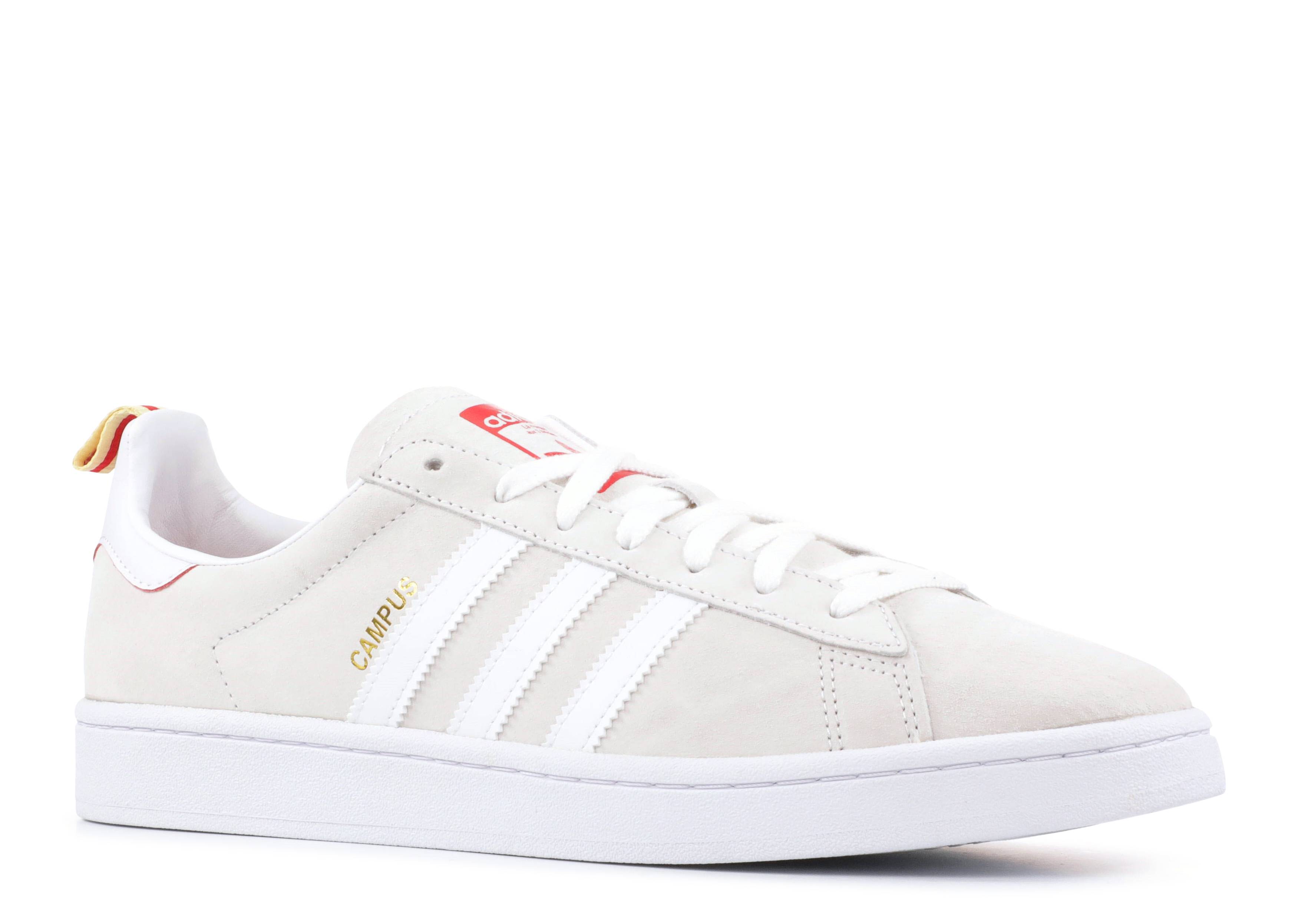 superstar adidas gold and black