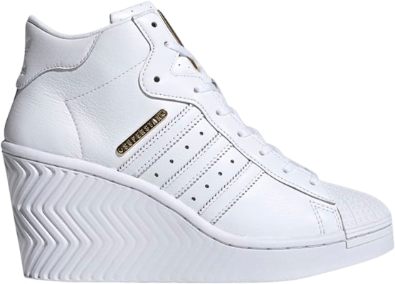 White and gold adidas 2025 high tops