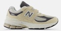 Buy (Youth) New Balance 2002R Sneakers Beige Casual Shoes Yellow PV2002FA-W