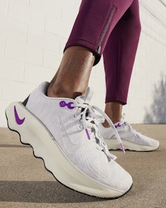 (W) Nike Motiva Wanita DV1238-009 2