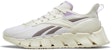 (W) Reebok Zig Kinetica 3 'Chalk Taupe' dalam warna Kelabu Kapur. HR1319