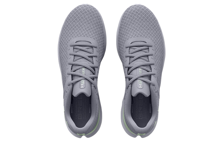 Shop (W) Under Armour Charged Breeze ''Mod Grijs Wit'' 3025130-103