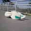 Shop (Women) Adidas Adizero Adios Pro 4 Cloud White/Pure Teal/Carbon JR1247
