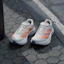 Details for (W) Adidas Adizero Boston 13 Blanco/Anaranjado Beam/Naranja Ácido JP9249