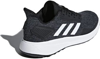 Shop adidas Duramo 9 簡約休閒 低幫 跑步鞋 女款 黑白
