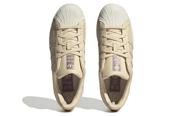 Shop adidas originals Superstar 防滑耐磨輕便 低筒 板鞋 女款 白褐