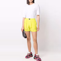 Lookbook (Women) Balenciaga SS22 Yellow High-Waisted Solid Color Shorts. 671664TMO607204