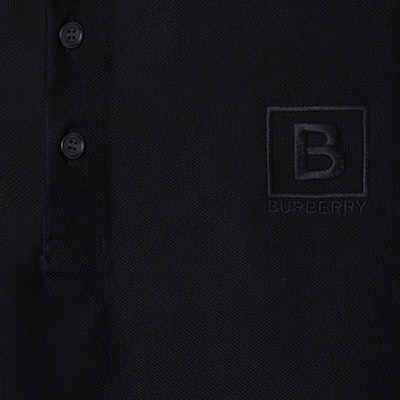 (W) Burberry SS22 Polo Negro con Logo Bordado y Color Sólido. 80526531 Sizing (W) Burberry SS22 Polo Negro con Logo Bordado y Color Sólido. 80526531