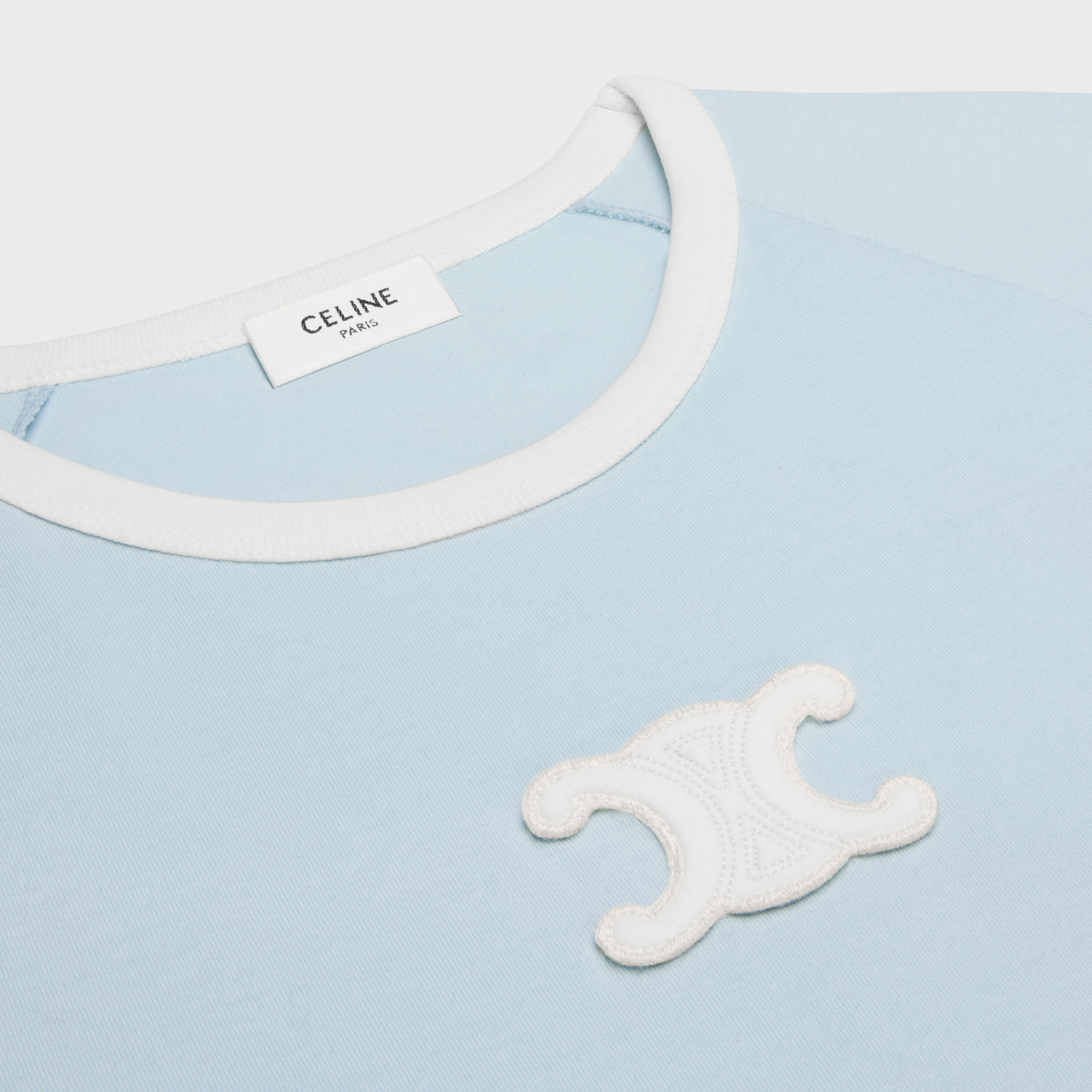 Shop (Women) CELINE SS24  Short-Sleeve Fitted Tee with Contrast Logo Patch in Blue. 2X16O507Z-07HI