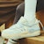 (W) Champion Essentials Bumper V1 'Eggnog Ballet Blue' dalam warna Biru Ballet Eggnog. U3AFCTW11M2