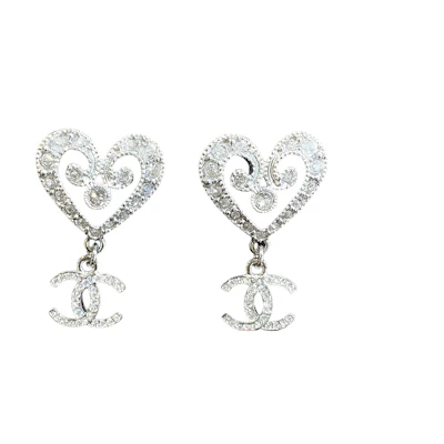 (Women) CHANEL 23K Silver Heart Hollow Pendant Double C Earrings for Women. ABC161-B14705-NS703