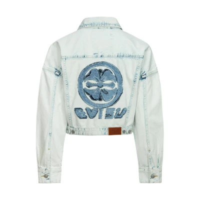(Women) EVISU SS24 Denim Jacket with Floral & Logo Patches in Denim Blue. 2ESHTW4DJ4056FFDN
