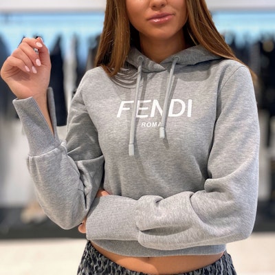 (Women) FENDI FW22 Oversized Logo Hoodie Sweatshirt in Gray. FS7516ALCBF1IHH Shop (Women) FENDI FW22 Oversized Logo Hoodie Sweatshirt in Gray. FS7516ALCBF1IHH