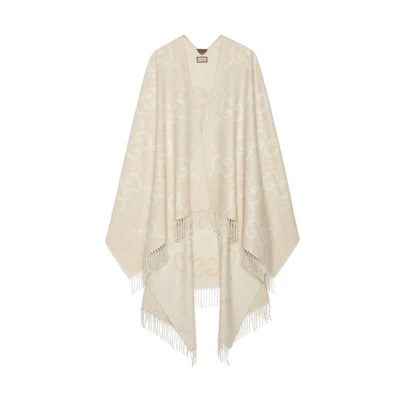(Women) GUCCI Logo Jacquard Fringe Cape Camel Color. 774308-4GABX-9877