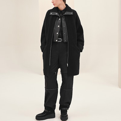 (Women) HERMES SS23 Black Knit Coat with Solid Color and Letter Pattern. H3H2101D402 Lookbook (Women) HERMES SS23 Black Knit Coat with Solid Color and Letter Pattern. H3H2101D402