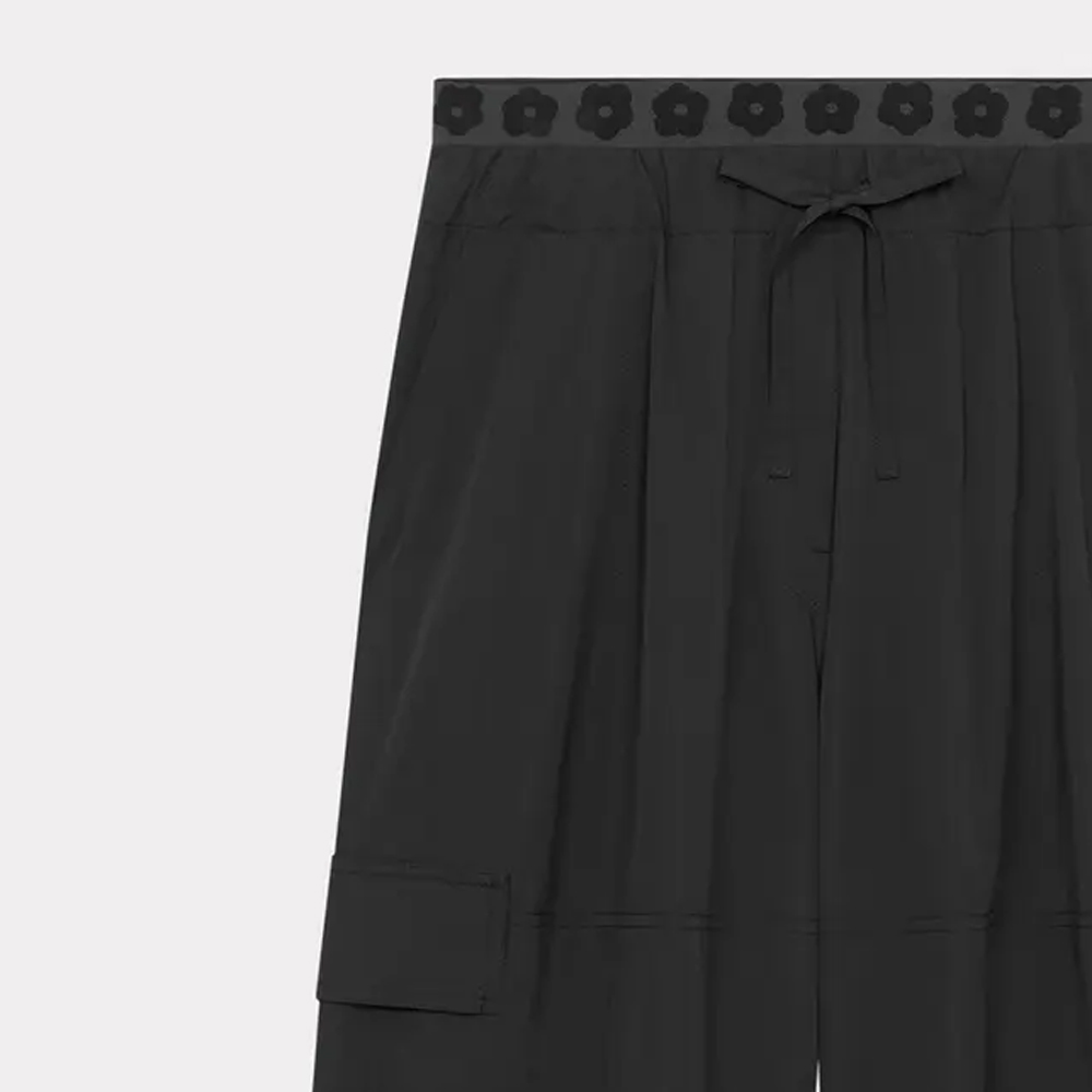 Shop (Women) KENZO SS24  Black Elastic Straight Leg Pants with Sakura Pattern. FE52PA0879FI-99