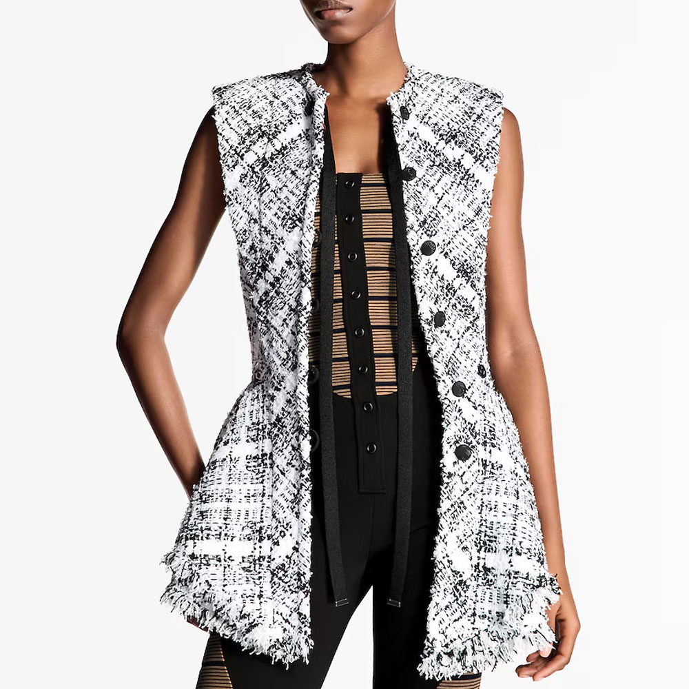 Lookbook (W) LOUIS VUITTON Chaqueta de Tweed Negra sin Mangas con Volantes. 1AHGQC