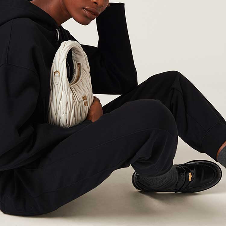 Purchase (Women) MIU MIU FW23  Black Knit Drawstring Jogger Sweatpants. MJP302-13FV-F0002-S-232