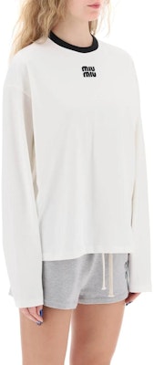 (Women) MIU MIU Logo Embroidered Relaxed Fit Long Sleeve T-Shirt Women White SS24. MJL992-14EL-F0009 Lookbook (Women) MIU MIU Logo Embroidered Relaxed Fit Long Sleeve T-Shirt Women White SS24. MJL992-14EL-F0009