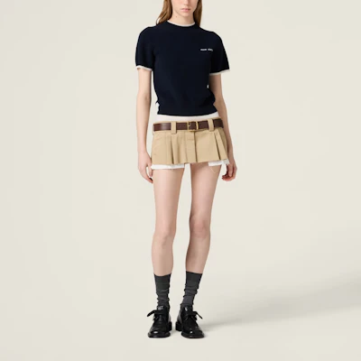 (Women) MIU MIU SS25 Blue Cashmere Knit Short-Sleeve Logo T-Shirt. MMLA56-16ON-F0960-S-OOO Lookbook (Women) MIU MIU SS25 Blue Cashmere Knit Short-Sleeve Logo T-Shirt. MMLA56-16ON-F0960-S-OOO