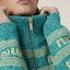 Details for (W) MIU MIU Kardigan Rajut Turquoise dengan Huruf Inlay dan Zip. MMF837-138E-F0136-S-OOO