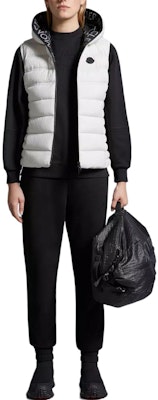 (Women) Moncler Embossed Logo Black Mid-Waist Knit Trackpants. J10938H00005809KR999 Shop (Women) Moncler Embossed Logo Black Mid-Waist Knit Trackpants. J10938H00005809KR999