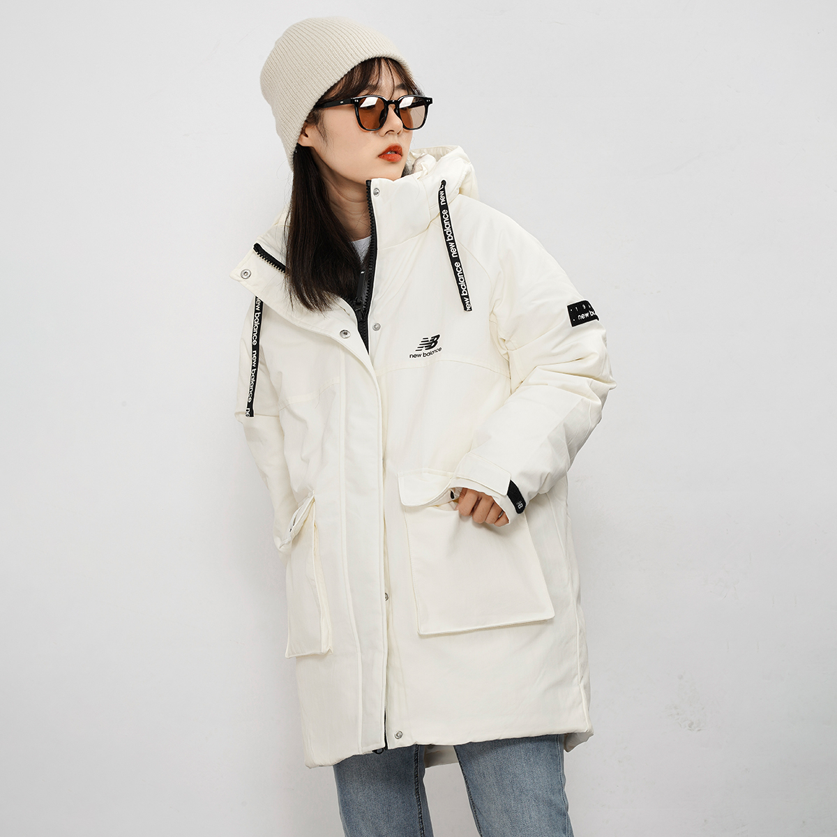 Shop (Women) New Balance Logo Embroidered Long Down Jacket Winter White Coat. AWJ14350-NMC