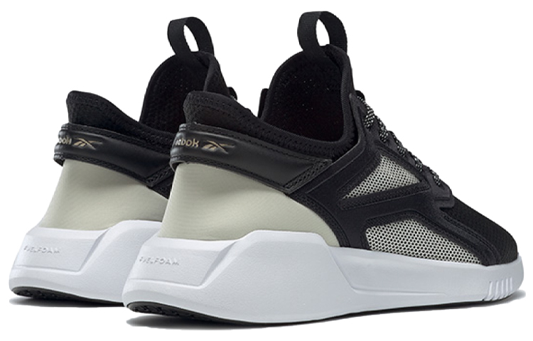 Shop (W) Reebok Freestyle Motion Lo 'Negro Blanco' FV6239