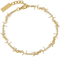 (Women) SAINT LAURENT Gold Brass Bracelet with Engraved Metal Logo Plaque. 757664Y15008030 (Women) SAINT LAURENT Gold Brass Bracelet with Engraved Metal Logo Plaque. 757664Y15008030