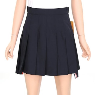 (W) Falda Thom Browne Azul Plisada Línea A Relajada Dobladillo Alto-Bajo. FGC402V-02872-415 Sizing (W) Falda Thom Browne Azul Plisada Línea A Relajada Dobladillo Alto-Bajo. FGC402V-02872-415