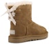 Shop (W) UGG Mini Continuity Bow Berbulu Coklat 1110705-CHE