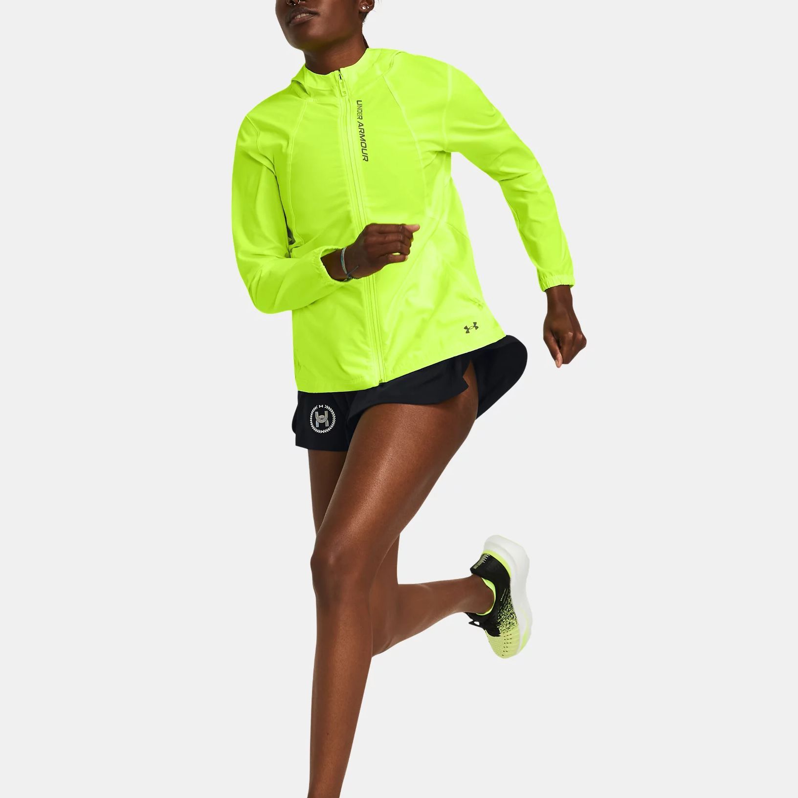 Shop (W) Chaqueta con capucha y cremallera Under Armour UA OutRun The Storm Amarillo Limón. 1377043-731