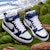 (JR) Nike Court Borough Mid 2 'Putih Signal Biru' CD7782-107