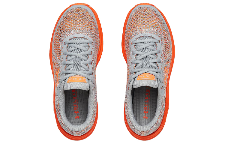Shop (JR) Under Armour Liquify Sportschoenen Grijs/Oranje 3022875-101