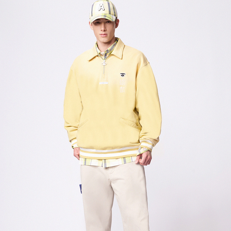 Shop AAPE 에이프 페이스 자수 하프집 풀오버 스웨트셔츠 옐로우. AAPSWMB300XXM