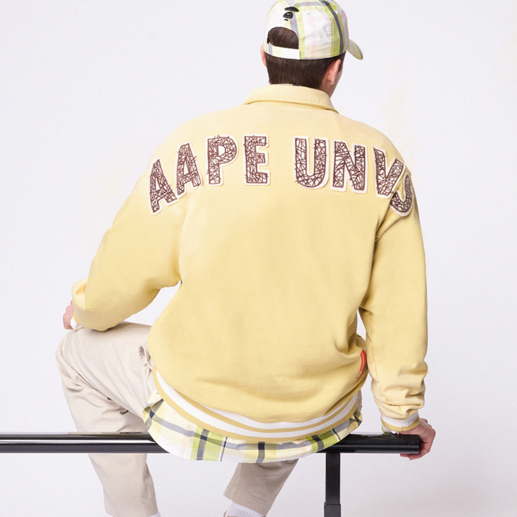 Purchase AAPE 에이프 페이스 자수 하프집 풀오버 스웨트셔츠 옐로우. AAPSWMB300XXM