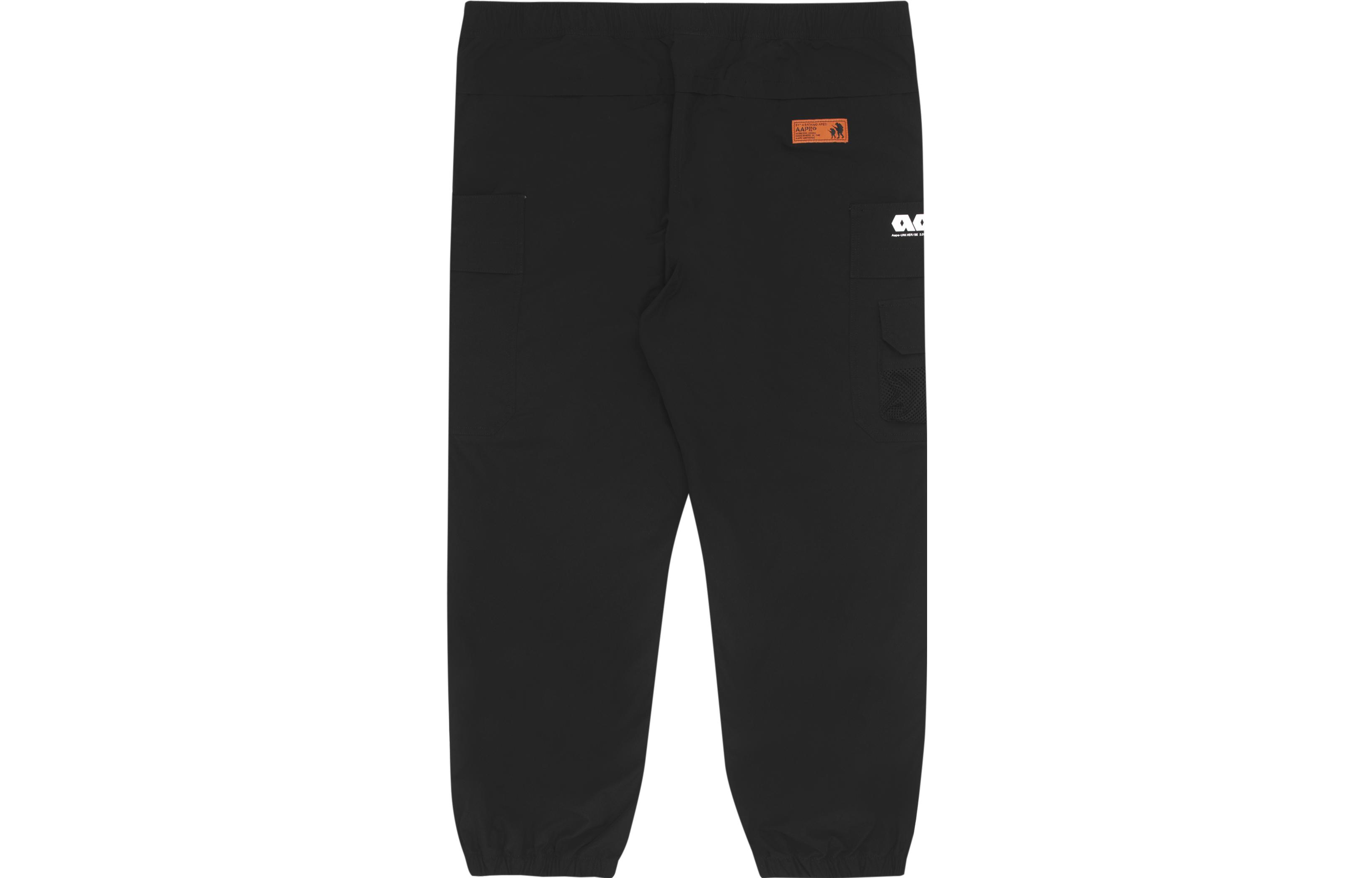 Lookbook AAPE SS22 에이프 페이스 로고 프린트 포켓 디자인 조거 팬츠. AAPPTM6827XXI