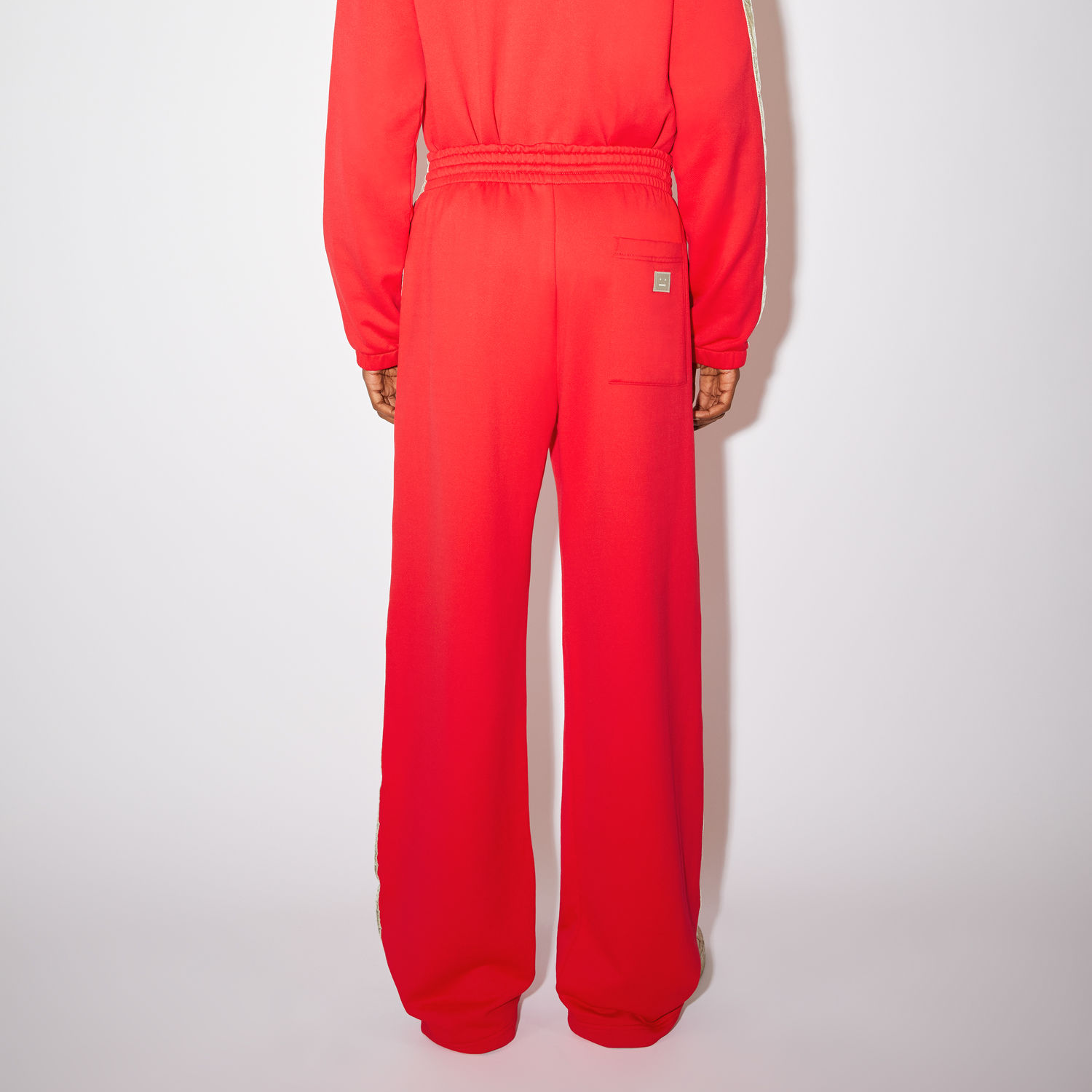 Shop Acne Studios SS22 红色宽松针织休闲裤 男女同款. CK0053-ACL