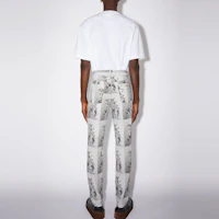 Shop Acne Studios SS22 圖案印花休閒長褲 男 灰色。 BK0437-902