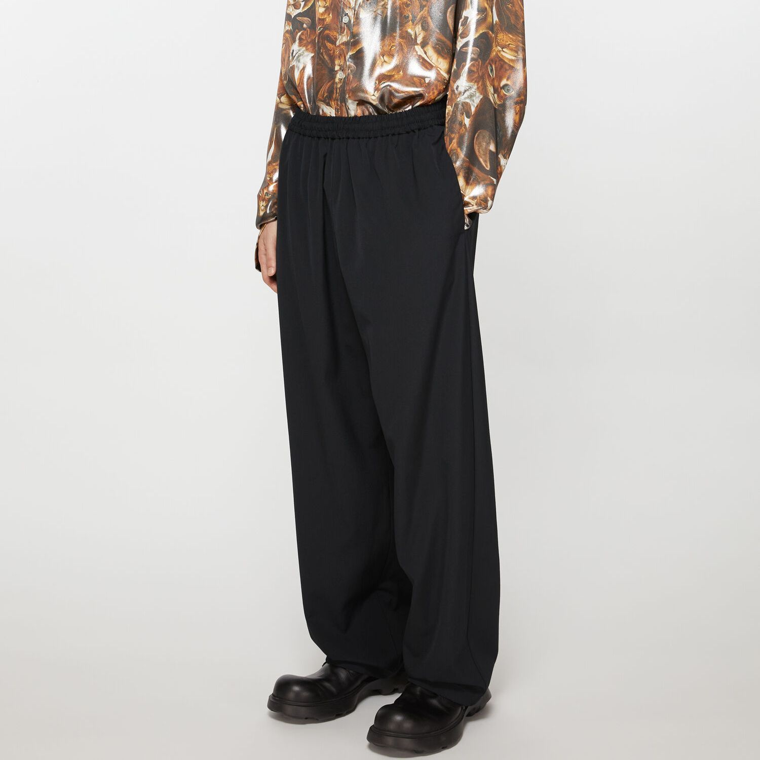 Purchase Pantalones Negros Unisex Acne Studios, Corte Relajado, Cintura Elástica y Pierna Recta. BK0593-900